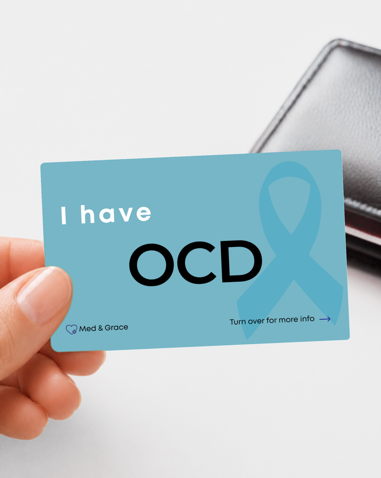 Teal OCD (Obsessive-Compulsive Disorder) medical alert card held in hand