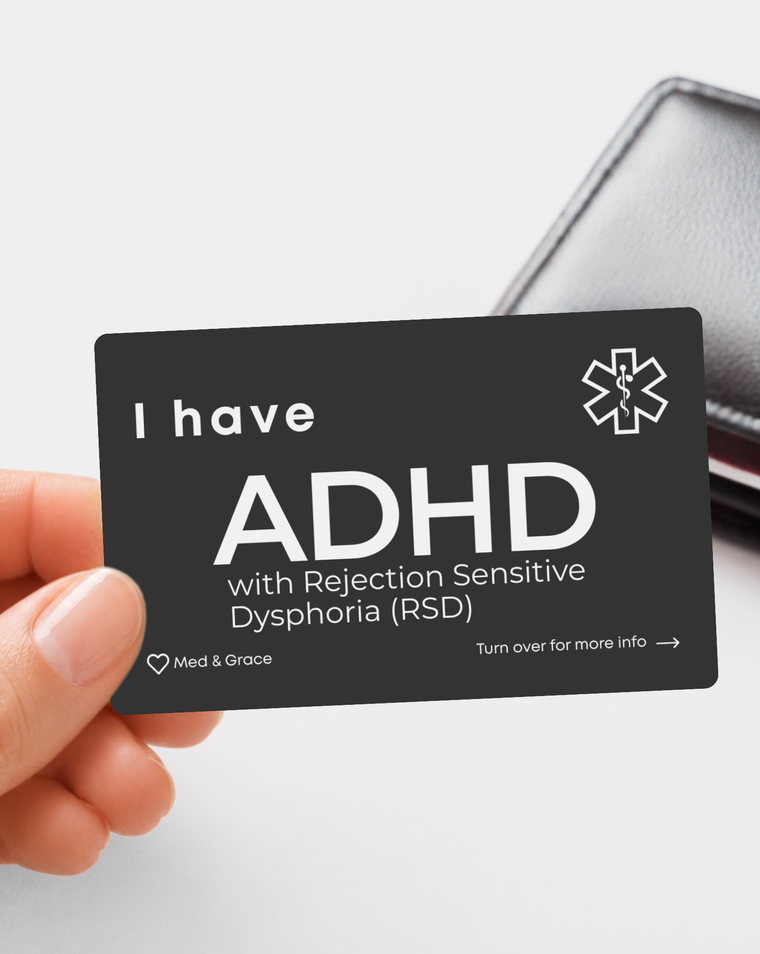 Black ADHD with Rejection Sensitive Dysphoria (RSD) engraved medical alert card held in hand