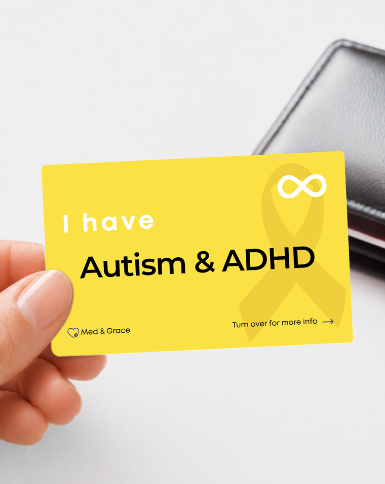 Yellow Autism and ADHD medical alert card held in hand
