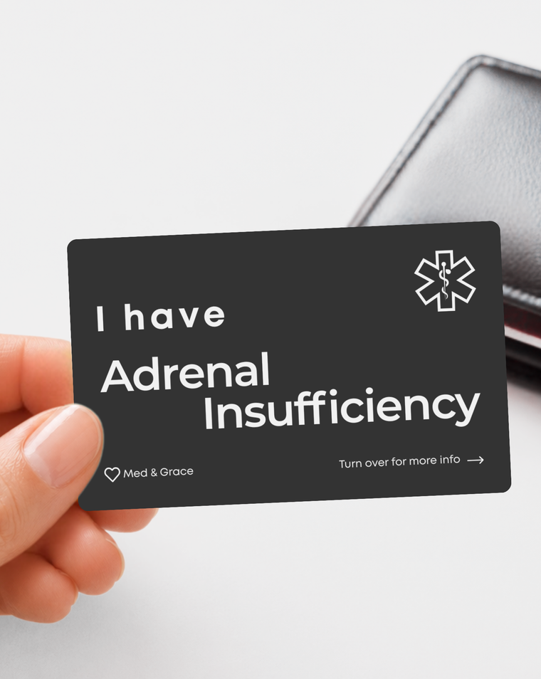 Black Adrenal Insufficiency engraved medical alert card held in hand