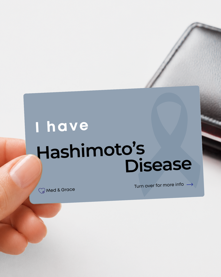 Grey Hashimoto’s Disease medical alert card held in hand