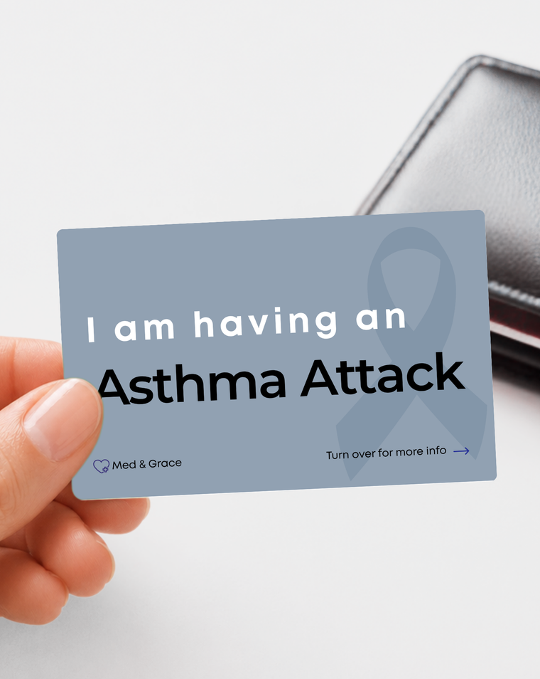Grey Asthma Attack medical alert card held in hand