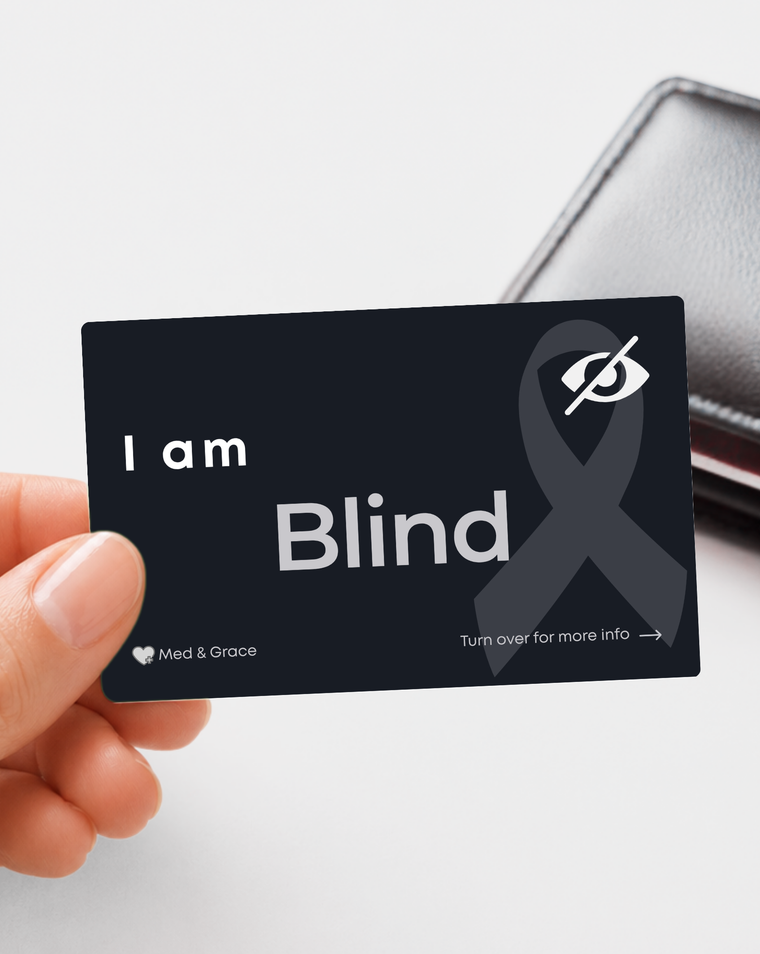 Black Blind medical alert card held in hand