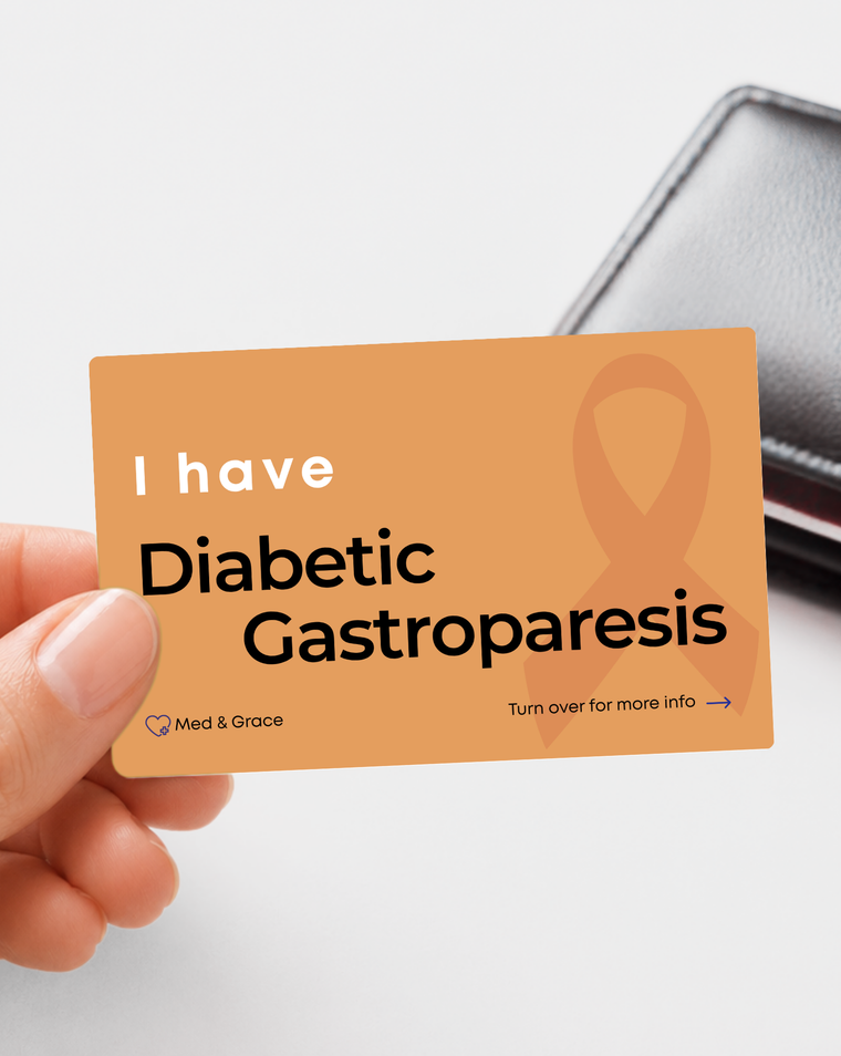 Orange Diabetic Gastroparesis medical alert card held in hand