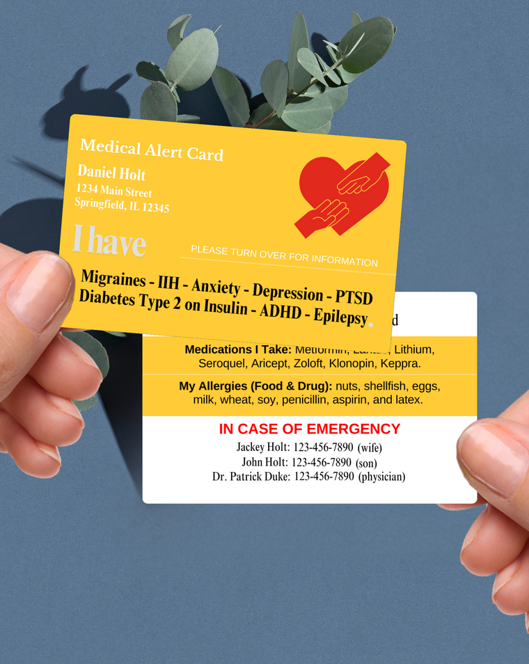 Yellow customised medical alert card shown with personalised medical details